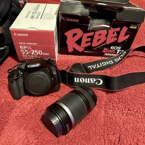 Canon Rebel EOS T2i digital camera , extra long lens, and bag
